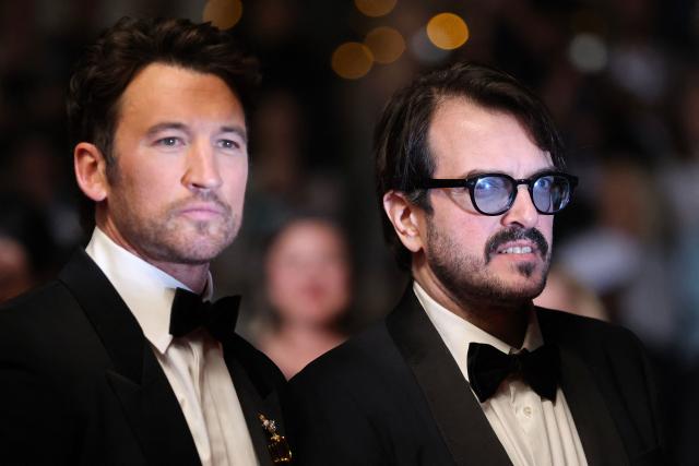 US actor Miles Teller (L) and Brazilian producer Rodrigo Teixeira arrive for the screening of the film "Paper Tiger" at the 79th edition of the Cannes Film Festival in Cannes, southern France on May 16, 2026. (Photo by Thibaud MORITZ / AFP)