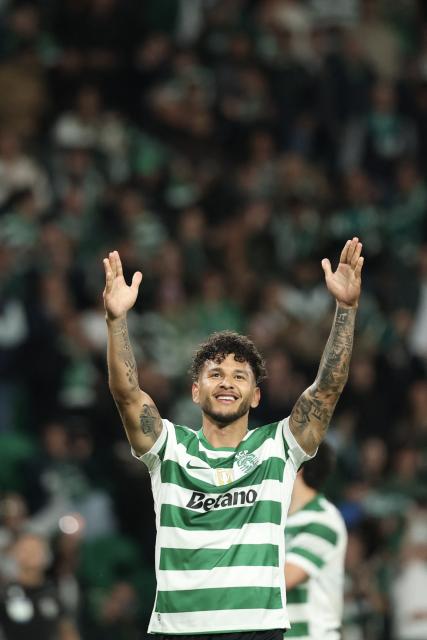 Sporting Lisbon's Colombian forward #97 Luis Suarez celebrates scoring his team's second goal during the Portuguese League football match between Sporting CP and Gil Vicente FC at the Jose Alvalade stadium in Lisbon on May 16, 2026. (Photo by PATRICIA DE MELO MOREIRA / AFP)