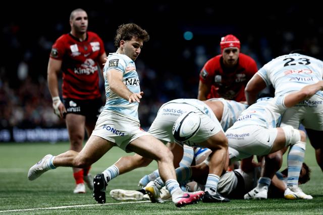 Racing 92' French scrum-half Leo Carbonneau kicks the ball during the French Top14 rugby union match between Racing 92 and Rugby Club Toulonnais (Toulon) at the Paris La Defense Arena in Nanterre, on the outskirts of Paris on May 16, 2026. (Photo by Kenzo TRIBOUILLARD / AFP)