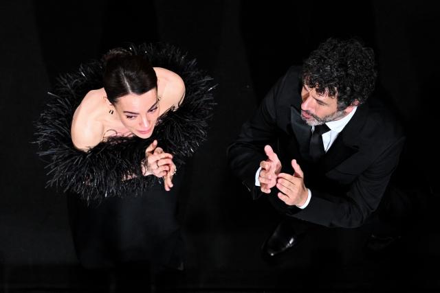Spanish actress Victoria Luengo and Spanish film director Rodrigo Sorogoyen acknowledge the audience after the screening of the film "El ser querido" (The Beloved) at the 79th edition of the Cannes Film Festival in Cannes, southern France on May 16, 2026. (Photo by Antonin THUILLIER / AFP)