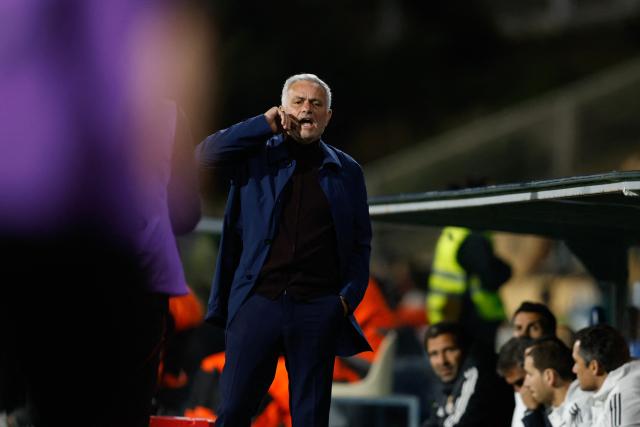 SL Benfica's Portuguese head coach Jose Mourinho shouts to players during the Portuguese League football match between GD Estoril Praia and SL Benfica at the Antonio Coimbra da Mota stadium in Estoril on May 16, 2026. (Photo by FILIPE AMORIM / AFP)