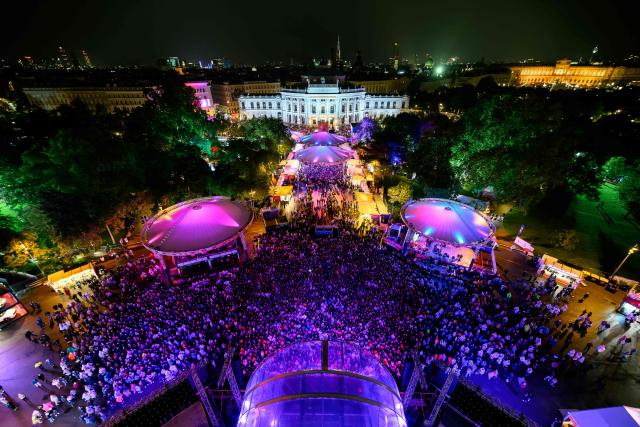 General view of spectators and fans gathering in the fan area to watch the final of the Eurovision Song Contest 2026 (ESC) outside the City Hall in Vienna, Austria; on May 16, 2026. (Photo by MAX SLOVENCIK / APA / AFP) / Austria OUT