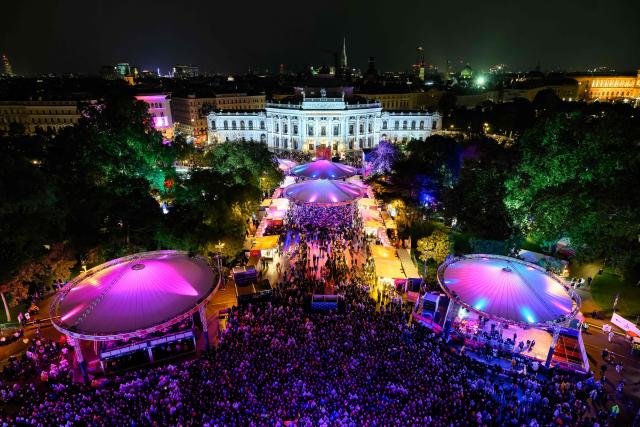 General view of spectators and fans gathering in the fan area to watch the final of the Eurovision Song Contest 2026 (ESC) outside the City Hall in Vienna, Austria; on May 16, 2026. (Photo by MAX SLOVENCIK / APA / AFP) / Austria OUT