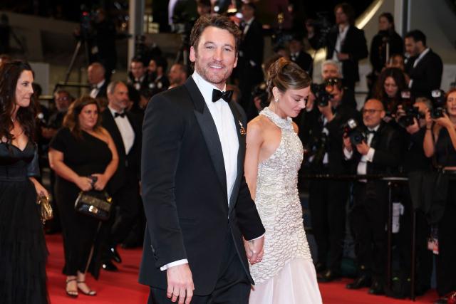 US actor Miles Teller and his wife US actress Keleigh Teller leave after the screening of the film "Paper Tiger" at the 79th edition of the Cannes Film Festival in Cannes, southern France on May 16, 2026. (Photo by Sameer AL-DOUMY / AFP)