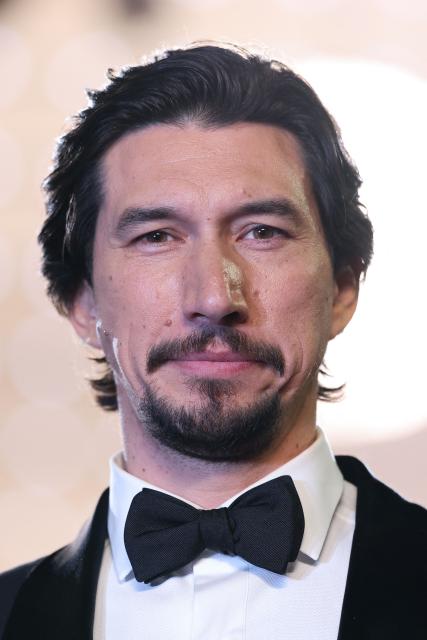 US actor Adam Driver leaves after the screening of the film "Paper Tiger" at the 79th edition of the Cannes Film Festival in Cannes, southern France on May 16, 2026. (Photo by Sameer AL-DOUMY / AFP)