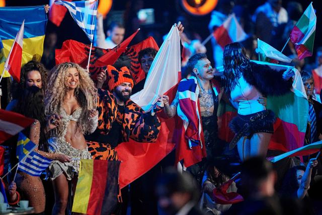 Greek singer Akylas Mytilinaios (C) reacts during the final of the Eurovision Song Contest 2026 (ESC) at Wiener Stadthalle in Vienna, Austria on May 16, 2026. (Photo by GEORG HOCHMUTH / APA / AFP) / Austria OUT