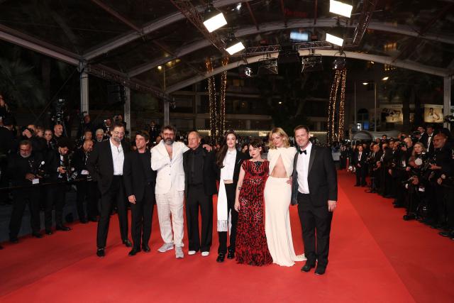 (From L) US actor Eric Wareheim, French producer Hugo Selignac, French director and screenwriter Quentin Dupieux, US actor Woody Harrelson, Canadian actress Charlotte Le Bon, US actress Kristen Stewart, British-French actress Emma Mackey and US actor Tim Heidecker arrive for the screening of the film "Full Phil" at the 79th edition of the Cannes Film Festival in Cannes, southern France on May 16, 2026. (Photo by Sameer AL-DOUMY / AFP)