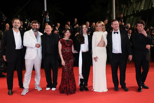 (From L) US actor Eric Wareheim, French director and screenwriter Quentin Dupieux, US actor Woody Harrelson, US actress Kristen Stewart, Canadian actress Charlotte Le Bon, British-French actress Emma Mackey, US actor Tim Heidecker and French producer Hugo Selignac arrive for the screening of the film "Full Phil" at the 79th edition of the Cannes Film Festival in Cannes, southern France on May 16, 2026. (Photo by Thibaud MORITZ / AFP)