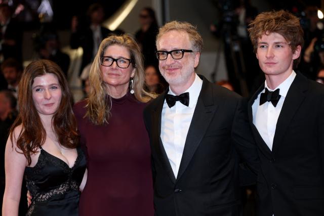 US producer and director Alexandra Dickson Gray (2L) and her husband US director James Gray (2R) leave after the screening of the film "Paper Tiger" at the 79th edition of the Cannes Film Festival in Cannes, southern France on May 16, 2026. (Photo by Sameer AL-DOUMY / AFP)