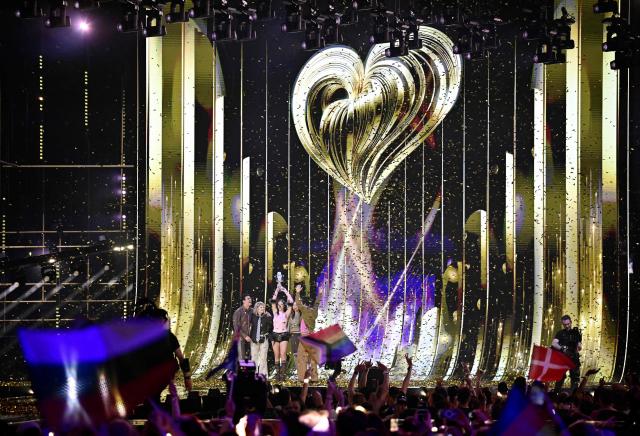 Winner Darina Nikolaeva Yotova, aka Dara and representing Bulgaria with the song 'Bangaranga' (C) celebrates with the trophy after the final of the Eurovision Song Contest 2026 (ESC) at Wiener Stadthalle in Vienna, Austria on May 16, 2026. (Photo by Tobias SCHWARZ / AFP)
