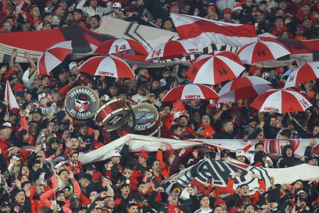 River Plate’s fans cheer for their team during the Argentine Professional Football League Apertura tournament semifinal between River Plate and Rosario Central at MAS Monumental Stadium in Buenos Aires on May 16, 2026. (Photo by Alejandro PAGNI / AFP)