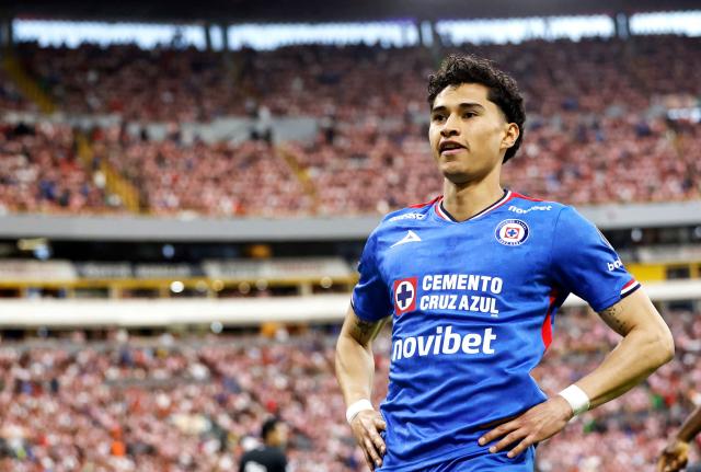 Cruz Azul's midfielder #16 Jeremy Marquez celebrates after scoring the opening goal during the Liga MX Clausura semifinal second-leg football match between Guadalajara and Cruz Azul at Jalisco stadium in Guadalajara, Jalisco state, Mexico on May 16, 2026. (Photo by ULISES RUIZ / AFP)