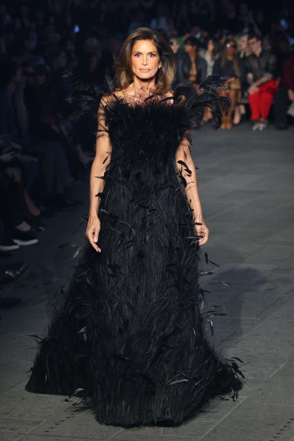 US model Cindy Crawford walks the runway during the Gucci Cruise 2027 collection fashion show at Times Square in New York on May 16, 2026. (Photo by ANGELA WEISS / AFP)