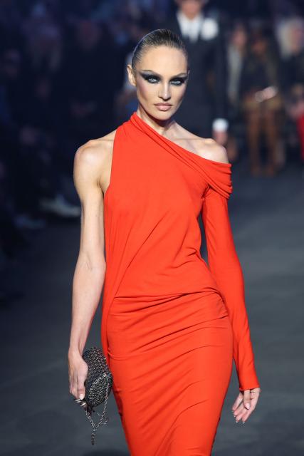 South African model Candice Swanepoel walks the runway during the Gucci Cruise 2027 collection fashion show at Times Square in New York on May 16, 2026. (Photo by ANGELA WEISS / AFP)