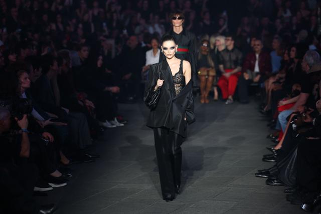 A model walks the runway during the Gucci Cruise 2027 collection fashion show at Times Square in New York on May 16, 2026. (Photo by ANGELA WEISS / AFP)
