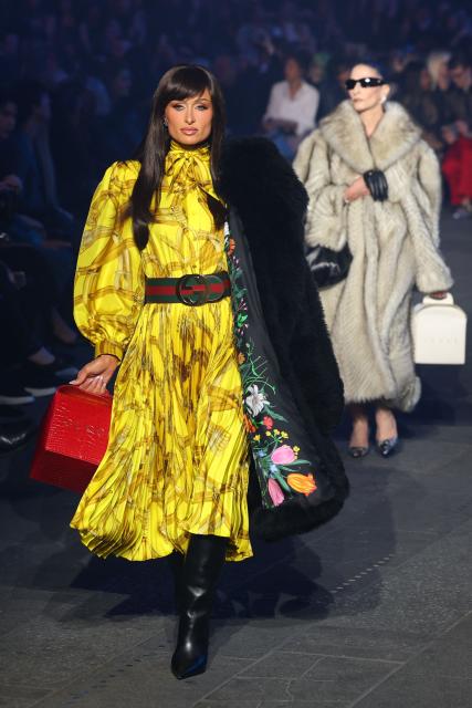 US socialite Paris Hilton walks the runway during the Gucci Cruise 2027 collection fashion show at Times Square in New York on May 16, 2026. (Photo by ANGELA WEISS / AFP)