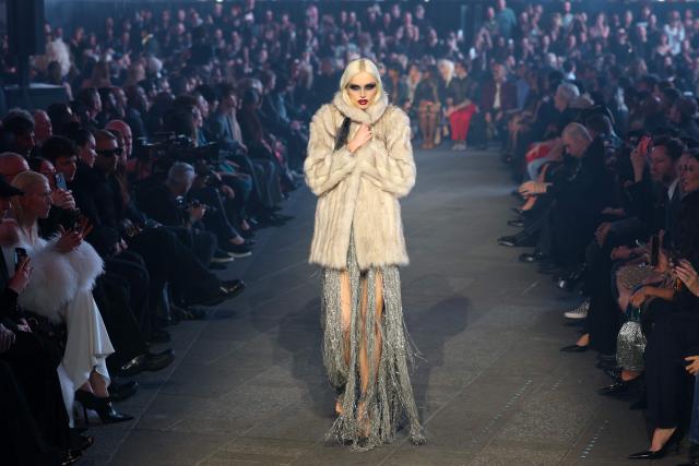 A model walks the runway during the Gucci Cruise 2027 collection fashion show at Times Square in New York on May 16, 2026. (Photo by ANGELA WEISS / AFP)