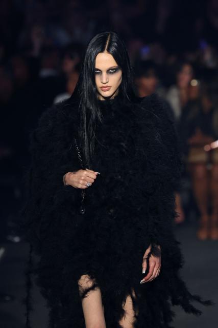 A model walks the runway during the Gucci Cruise 2027 collection fashion show at Times Square in New York on May 16, 2026. (Photo by ANGELA WEISS / AFP)