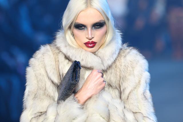 A model walks the runway during the Gucci Cruise 2027 collection fashion show at Times Square in New York on May 16, 2026. (Photo by ANGELA WEISS / AFP)