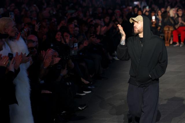 Georgian fashion designer and Creative Director of Gucci Demna acknowledges the crowd during the Gucci Cruise 2027 collection fashion show at Times Square in New York on May 16, 2026. (Photo by ANGELA WEISS / AFP)