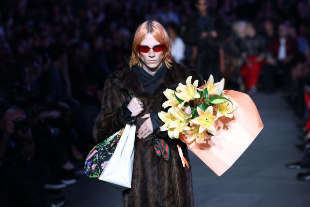 A model walks the runway during the Gucci Cruise 2027 collection fashion show at Times Square in New York on May 16, 2026. (Photo by ANGELA WEISS / AFP)