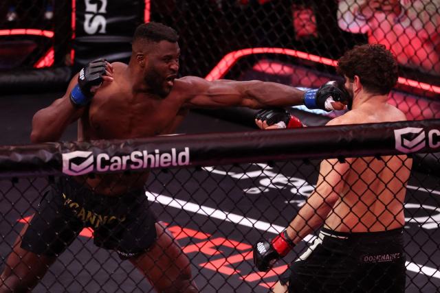 Cameroonian-French mixed martial arts fighter Francis Ngannou lands a punch on Brazilian mixed martial arts fighter Philipe Lins during their heavyweight bout at MVP MMA 1 at the Intuit Dome in Inglewood, California, on May 16, 2026. (Photo by Patrick T. Fallon / AFP)
