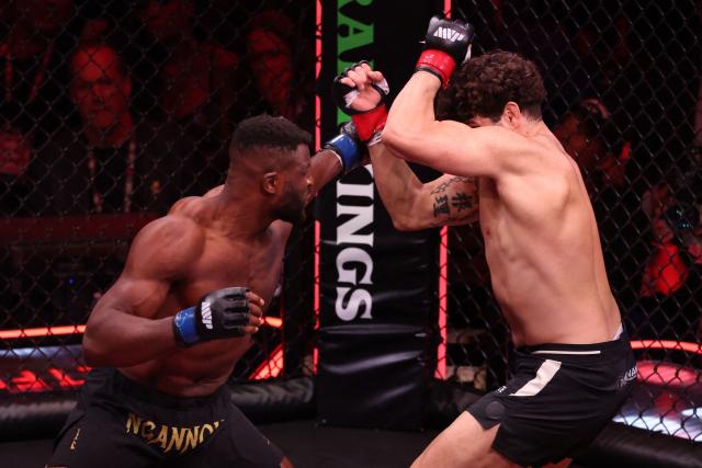 Cameroonian-French mixed martial arts fighter Francis Ngannou and Brazilian mixed martial arts fighter Philipe Lins fight during their heavyweight bout at MVP MMA 1 at the Intuit Dome in Inglewood, California, on May 16, 2026. (Photo by Patrick T. Fallon / AFP)