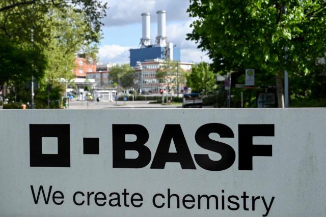 The logo of German chemical giant BASF is pictured in front of its headquarters in Ludwigshafen, western Germany, on April 20, 2026. Germany's industrial decline is taking a painful toll on communities that have long relied on local manufacturing titans for jobs, prosperity and a sense of a secure future. (Photo by Kirill KUDRYAVTSEV / AFP) / TO GO WITH AFP STORY BY SAM REEVES