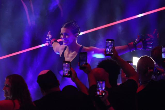 US Mixed Martial Arts (MMA) fighter Gina Carano arrives for her Featherweight Bout against US Mixed Martial Arts (MMA) fighter Ronda Rousey at the Intuit Dome in Inglewood, California, on May 16, 2026. (Photo by Patrick T. Fallon / AFP)