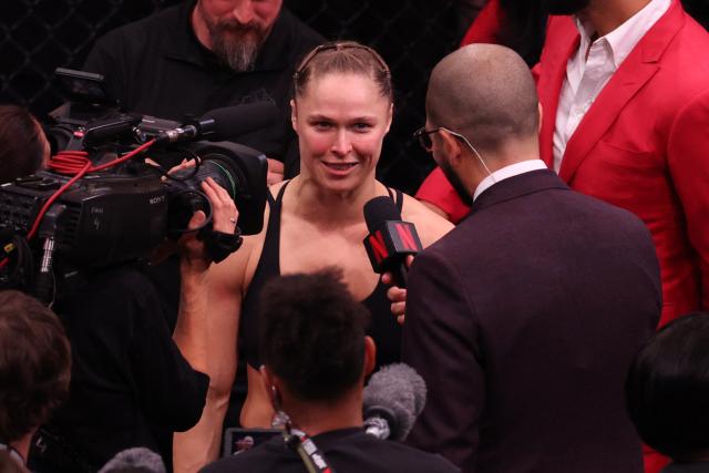 US Mixed Martial Arts (MMA) fighter Ronda Rousey is interviewed after defeating Gina Carano during their Featherweight Bout at the Intuit Dome in Inglewood, California, on May 16, 2026. (Photo by Patrick T. Fallon / AFP)