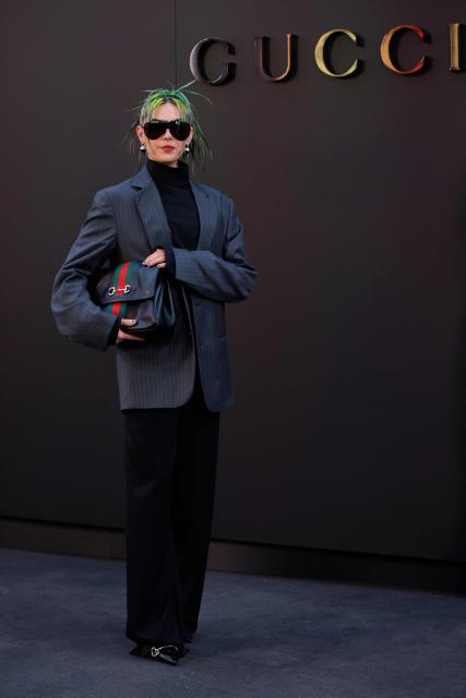 Emma Rogue attends the Gucci Cruise 2027 collection fashion show at Times Square in New York on May 16, 2026. (Photo by Leonardo MUNOZ / AFP)