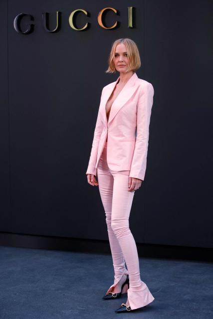 Australian model Lara Worthington attends the Gucci Cruise 2027 collection fashion show at Times Square in New York on May 16, 2026. (Photo by Leonardo MUNOZ / AFP)