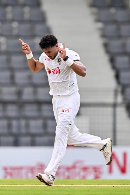 Bangladesh’s Taskin Ahmed celebrates after taking the wicket of Pakistan’s Abdullah Fazal during the second day of the second Test cricket match between Bangladesh and Pakistan at the Sylhet International Cricket Stadium in Sylhet on May 17, 2026. (Photo by Munir UZ ZAMAN / AFP)