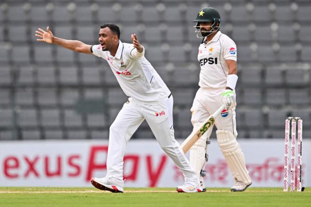 Bangladesh’s Shoriful Islam (L) unsuccessfully appeals for leg before wicket (LBW) against Pakistan’s Babar Azam during the second day of the second Test cricket match between Bangladesh and Pakistan at the Sylhet International Cricket Stadium in Sylhet on May 17, 2026. (Photo by Munir UZ ZAMAN / AFP)