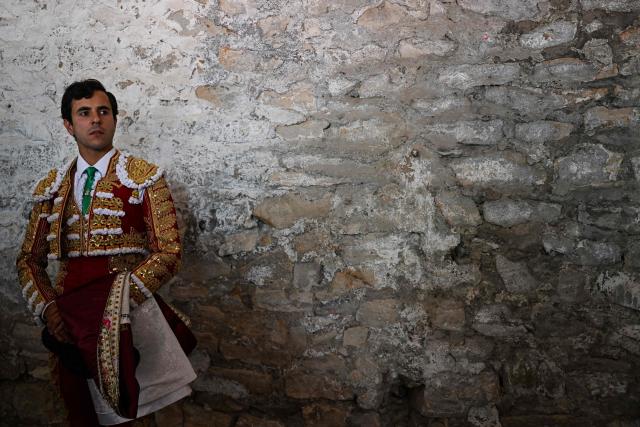 French matador Carlos Olsina waits for the parade ahead of his bullfight in Ales, Southern France, on May 16, 2026. (Photo by Gabriel BOUYS / AFP)