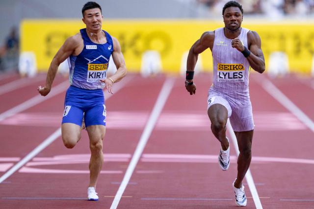 (L-R) Japan's Yoshihide Kiryu and US' Noah Lyles compete in the men's 100m final during the Golden Grand Prix athletics at the National Stadium in Tokyo on May 17, 2026. (Photo by Yuichi YAMAZAKI / AFP)