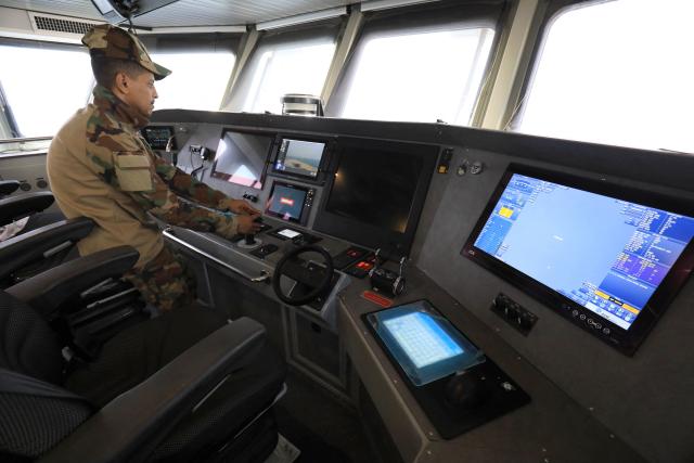 A member of the Libyan navy takes part in the "Dara’ al-Karama 2" military exercises, in the Ras al-Alba region in southeastern Libya on May 16, 2026. The military exercises involve extensive participation from various ground, air, and naval units, making them one of the largest exercises the Libyan Army has conducted in recent years, with more than 25,000 military personnel taking part. (Photo by Abdullah DOMA / AFP)