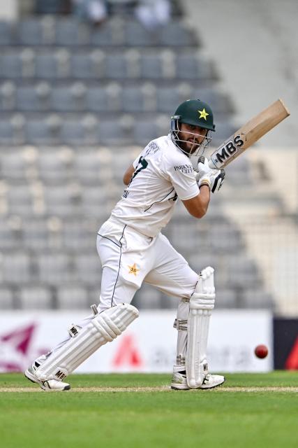Pakistan’s Salman Agha plays shot during the second day of the second Test cricket match between Bangladesh and Pakistan at the Sylhet International Cricket Stadium in Sylhet on May 17, 2026. (Photo by Munir UZ ZAMAN / AFP)