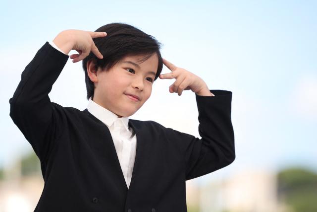 Japanese actor Rimu Kuwaki poses during a photocall of the film "Sheep in The Box" at the 79th edition of the Cannes Film Festival in Cannes, southern France on May 17, 2026. (Photo by Valery HACHE / AFP)