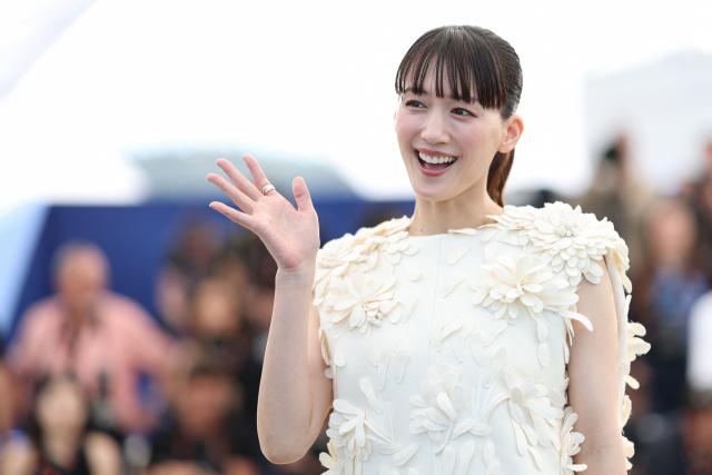 Japanese actress Haruka Ayase waves as she poses during a photocall of the film "Sheep in The Box" at the 79th edition of the Cannes Film Festival in Cannes, southern France on May 17, 2026. (Photo by Sameer AL-DOUMY / AFP)