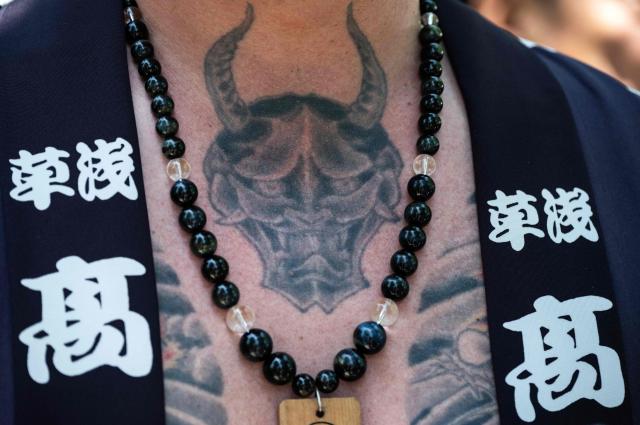A traditional irezumi tattoo is seen during final day of the Sanja Matsuri festival in Tokyo on May 17, 2026, one of Tokyo’s largest Shinto celebrations. (Photo by Andrew CABALLERO-REYNOLDS / AFP)