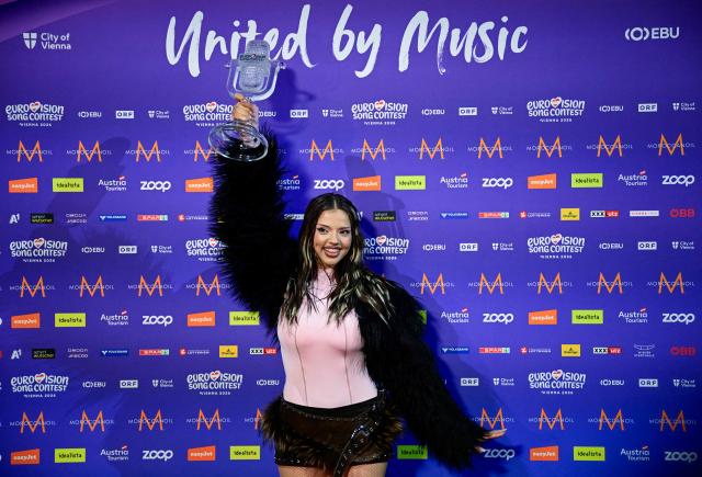 Winner Darina Nikolaeva Yotova, aka Dara and representing Bulgaria with the song 'Bangaranga' poses with the trophy during a photocall after she won the final of the Eurovision Song Contest 2026 (ESC) at Wiener Stadthalle in Vienna, Austria on May 16, 2026. (Photo by Tobias SCHWARZ / AFP)