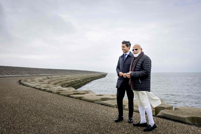 Prime Minister Rob Jetten and Indian Prime Minister Narendra Modi (R) visit the dam Afsluitdijk, in Den Oever, on May 17, 2026. (Photo by Koen van Weel / ANP / AFP) / Netherlands OUT