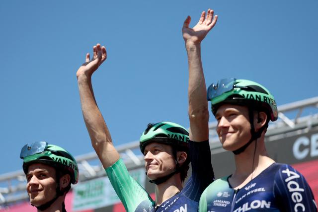 Decathlon CMA CGM Team Austrian rider Felix Gall waves on the signature podium before the 9th stage of the Giro d'Italia 2026 - Tour of Italy cycling race between Cervia and Corno alle Scale, central Italy on May 17, 2026. (Photo by Luca Bettini / AFP)