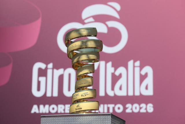 This photograph shows the Giro d'Italia trophy ("trofeo senza fine") on the signature podium before the 9th stage of the Giro d'Italia 2026 - Tour of Italy cycling race between Cervia and Corno alle Scale, central Italy on May 17, 2026. (Photo by Luca Bettini / AFP)