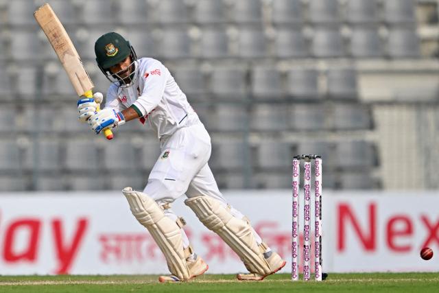 Bangladesh’s Mahmudul Hasan Joy watches the ball after playing a shot during the second day of the second Test cricket match between Bangladesh and Pakistan at the Sylhet International Cricket Stadium in Sylhet on May 17, 2026. (Photo by Munir UZ ZAMAN / AFP)
