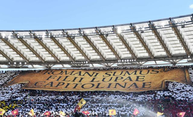 Supporters display a giant tifo ahead of the Italian Serie A football match between Roma and Lazio at Olympic stadium in Rome on May 17, 2026. (Photo by Isabella BONOTTO / AFP)