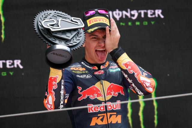Team Red Bull KTM Ajo's Alvaro Carpe celebrates his second placed finish on the podium for the Moto3 race of the 2026 Catalunya Moto Grand Prix at the Catalunya racetrack in Montmelo, near Barcelona, on May 17, 2026. (Photo by Lluis GENE / AFP)