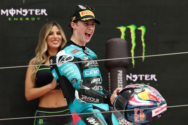 Team CF Moto Aspar Racing Team's Maximo Quiles celebrates on the podium after winning the Moto3 race of the 2026 Catalunya Moto Grand Prix at the Catalunya racetrack in Montmelo, near Barcelona, on May 17, 2026. (Photo by Lluis GENE / AFP)