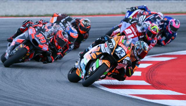 Team Speed Up Racing's Celestino Vietti (C) leads during the start of the Moto2 race of the 2026 Catalunya Moto Grand Prix at the Catalunya racetrack in Montmelo, near Barcelona, on May 17, 2026. (Photo by JOSE JORDAN / AFP)